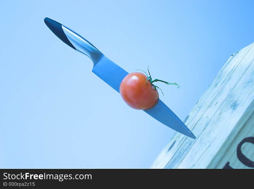 Sharp knife - Ripe tomato. Sharp knife - Ripe tomato