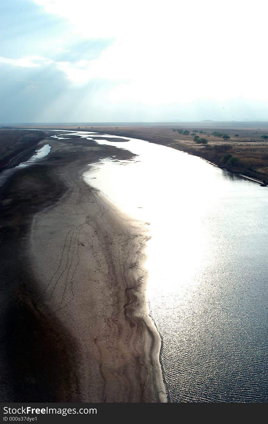 The orange river in South Africa. Photo is taken from the bridge at Bethulie. This is the longest bridge in South Africa. The orange river in South Africa. Photo is taken from the bridge at Bethulie. This is the longest bridge in South Africa.