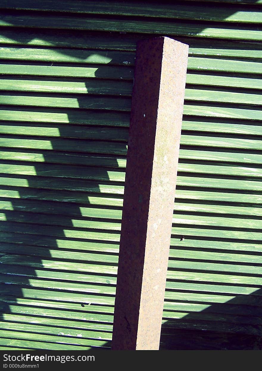 Green slated wood and girder