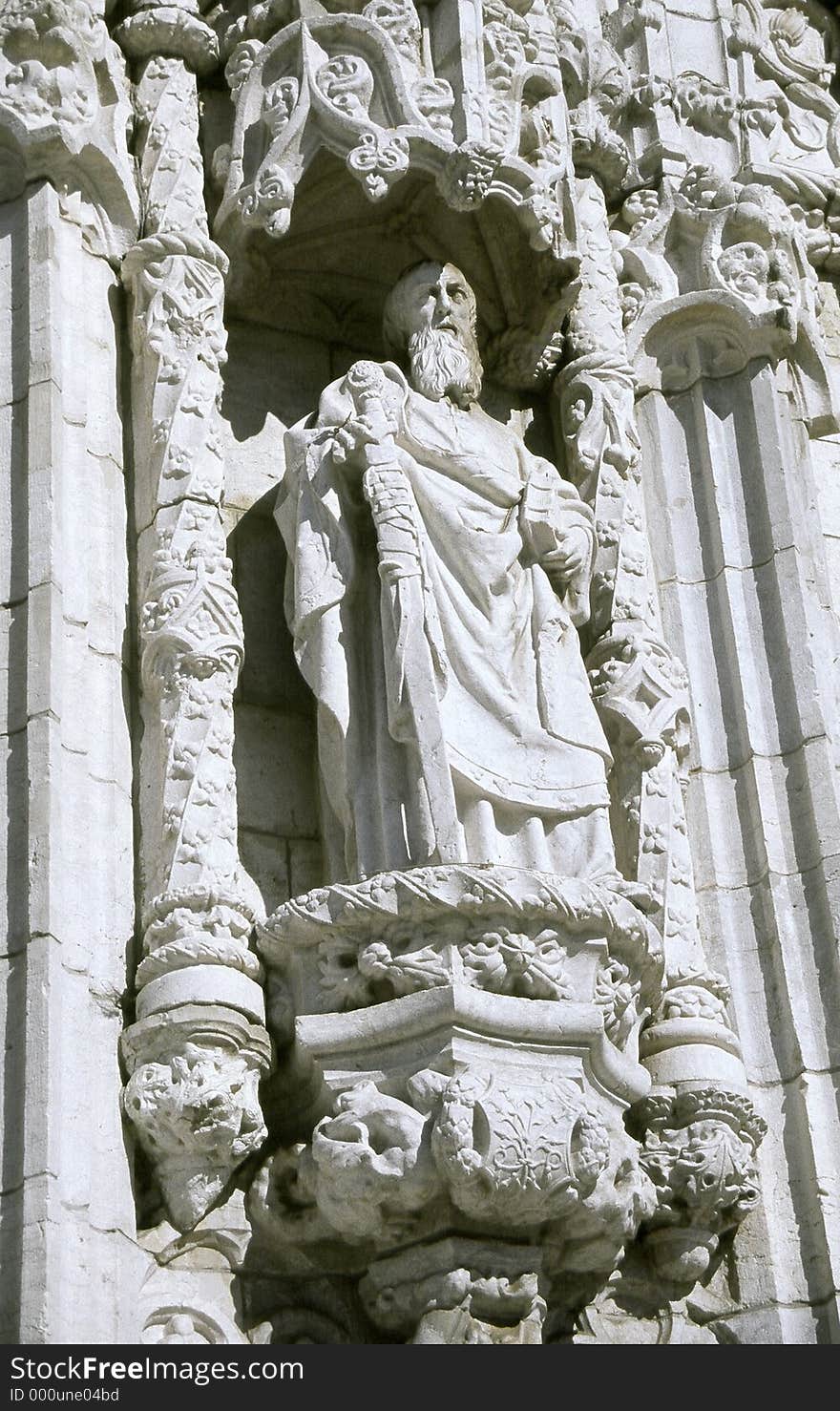 Outside statue on front wall of entrance to St. Jeronimos monastery in Belem, Portugal. Outside statue on front wall of entrance to St. Jeronimos monastery in Belem, Portugal