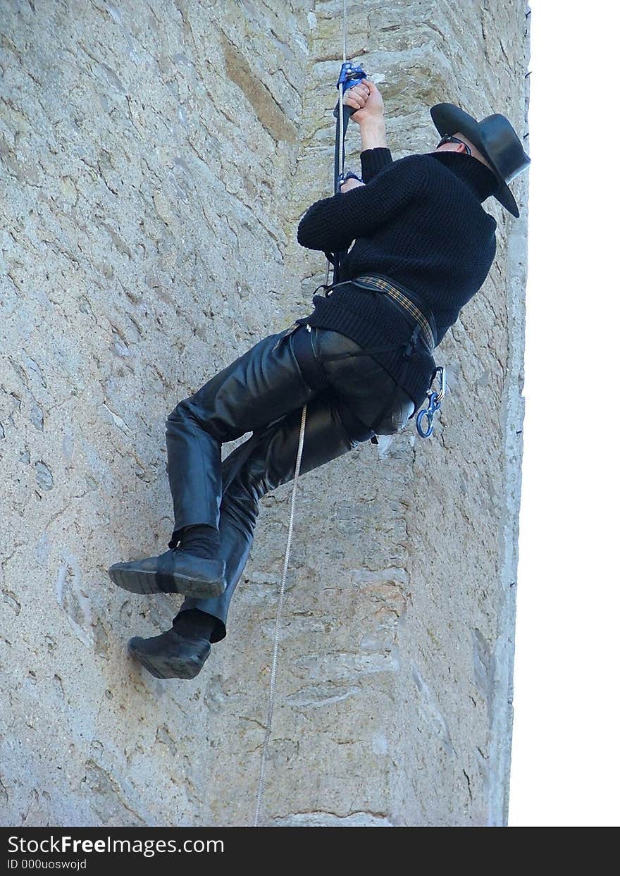 Man climbing up the wall