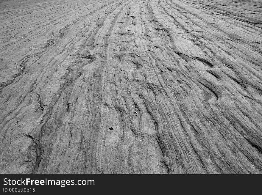 Black and White image of slickrock wave patterns extending to infinity. Black and White image of slickrock wave patterns extending to infinity.