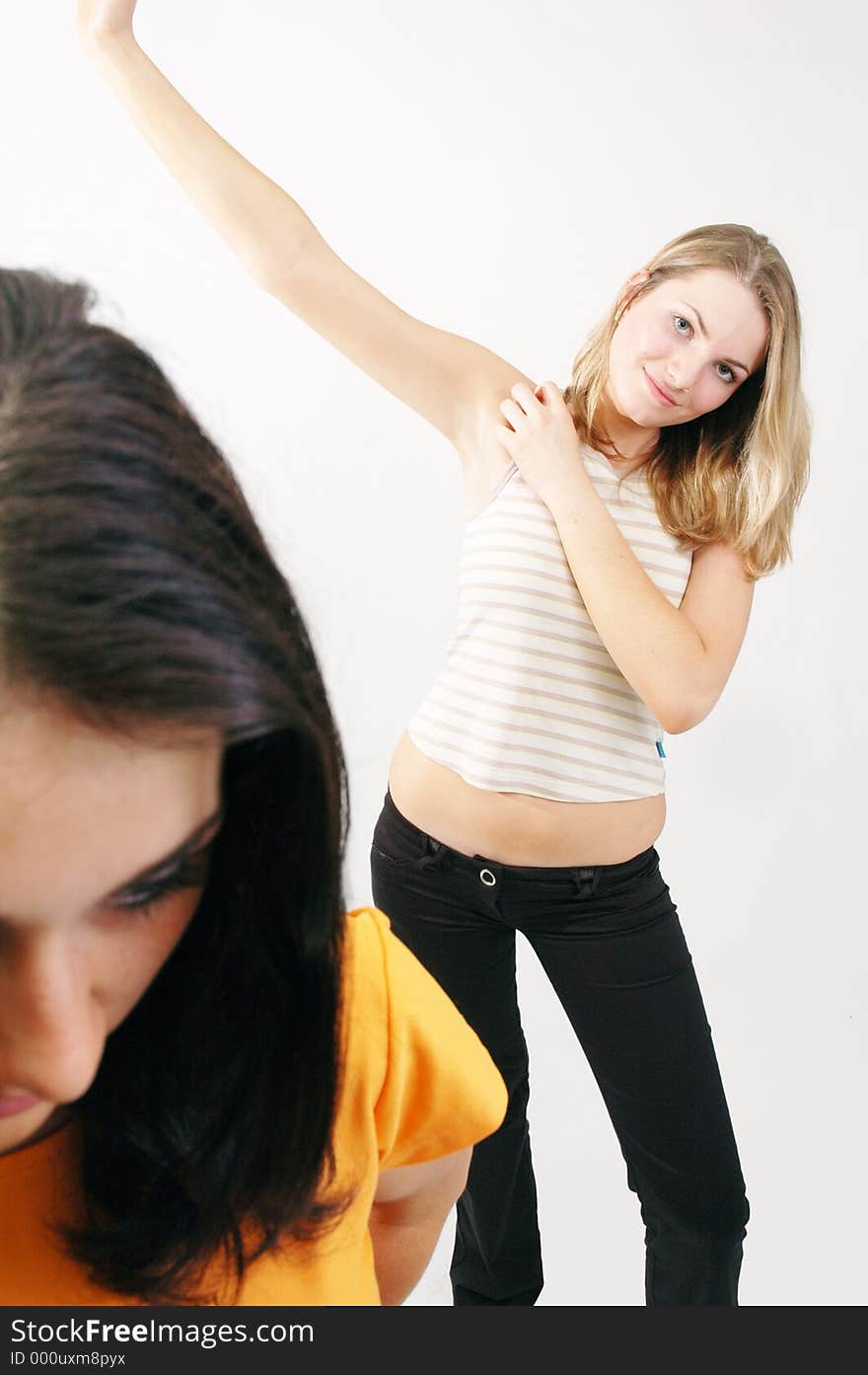 Two young girls taking photos