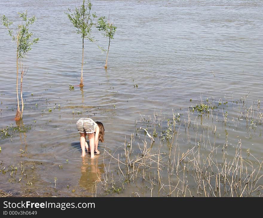 Little Girl Into The Water