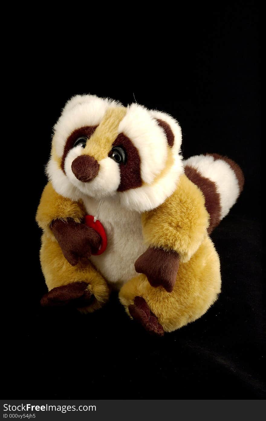 A raccoon teddy