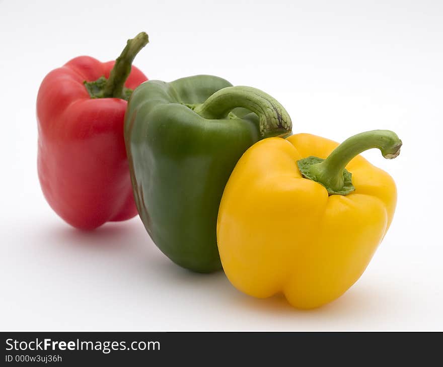 Close up of yellow green and red pepper