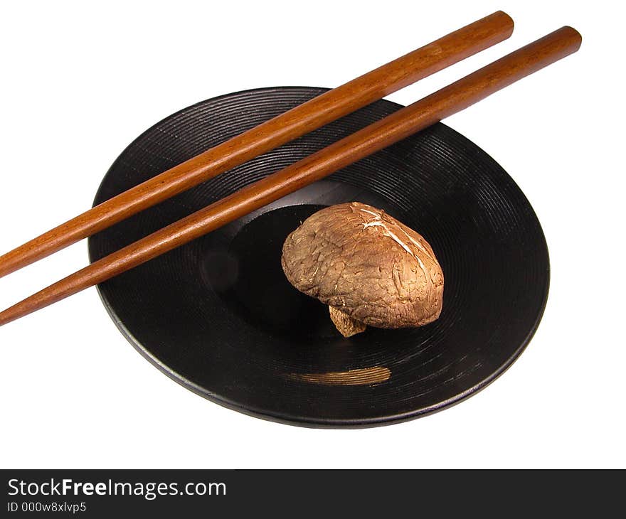 Chopsticks,mushroom and plate over white background. Chopsticks,mushroom and plate over white background