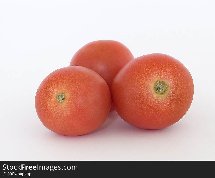 Three tomatoes close up