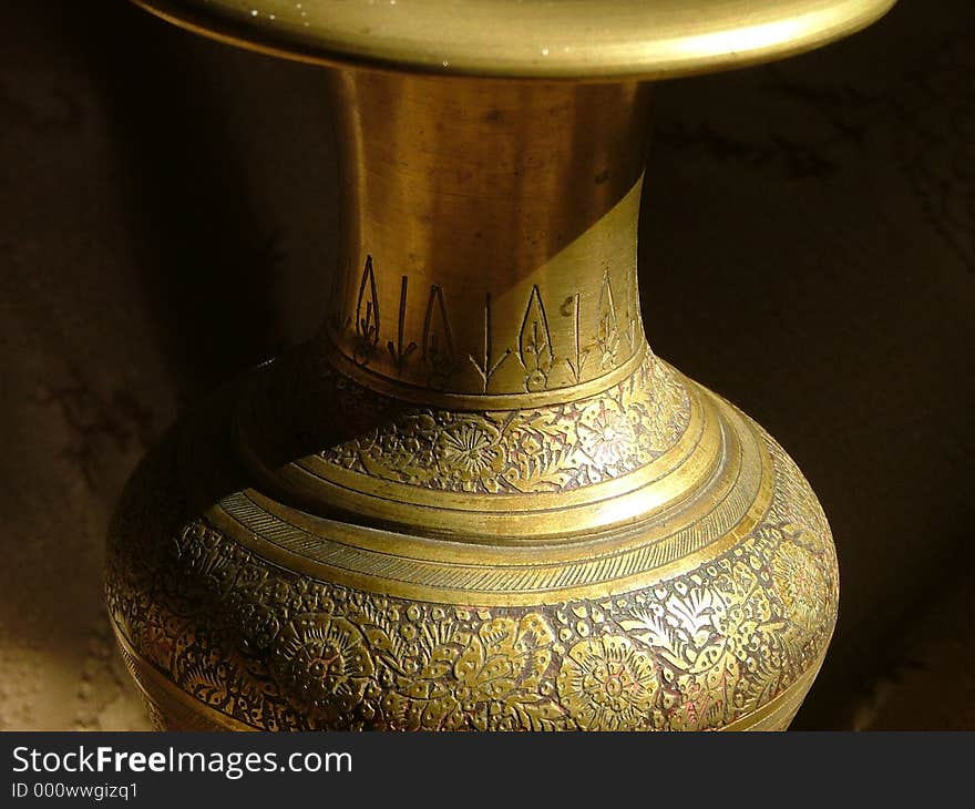 Artistic gilded vase. Artistic gilded vase