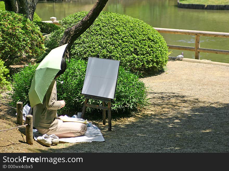 Japanese artist in Rikugien park, Tokyo, Japan