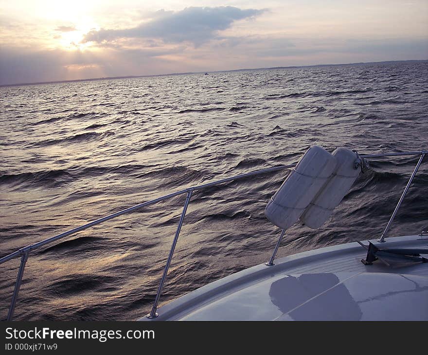 Boat view of a sunset on the bay. Boat view of a sunset on the bay