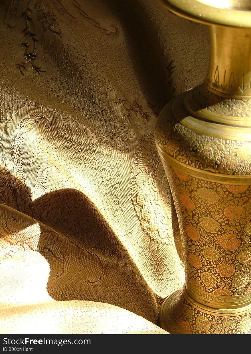 Artistic golden vase. Artistic golden vase