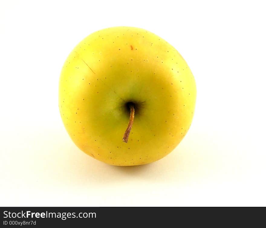 A bright yellow apple