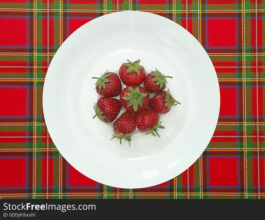 White plate with strawberries. White plate with strawberries