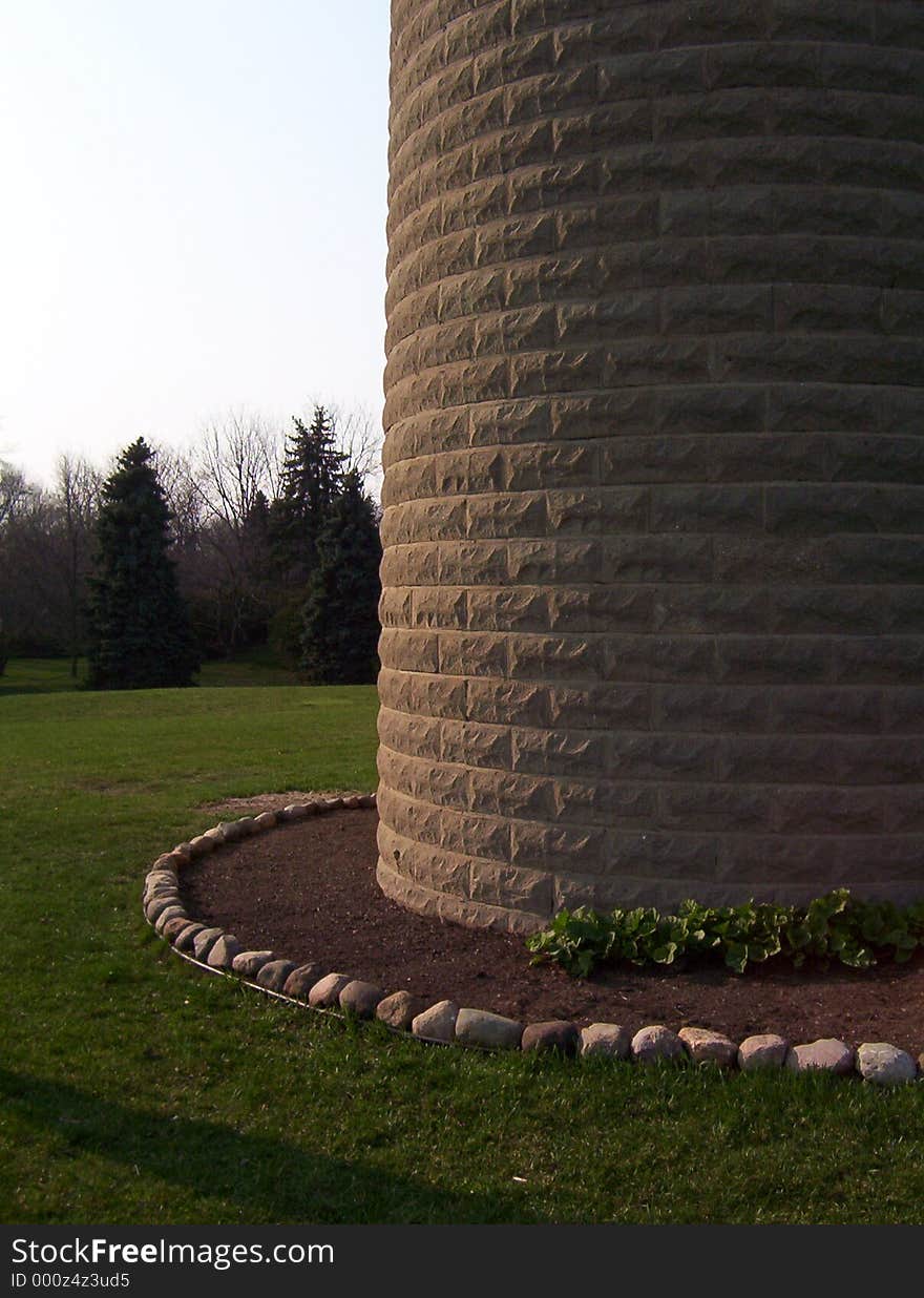 A barn's silo at dusk
