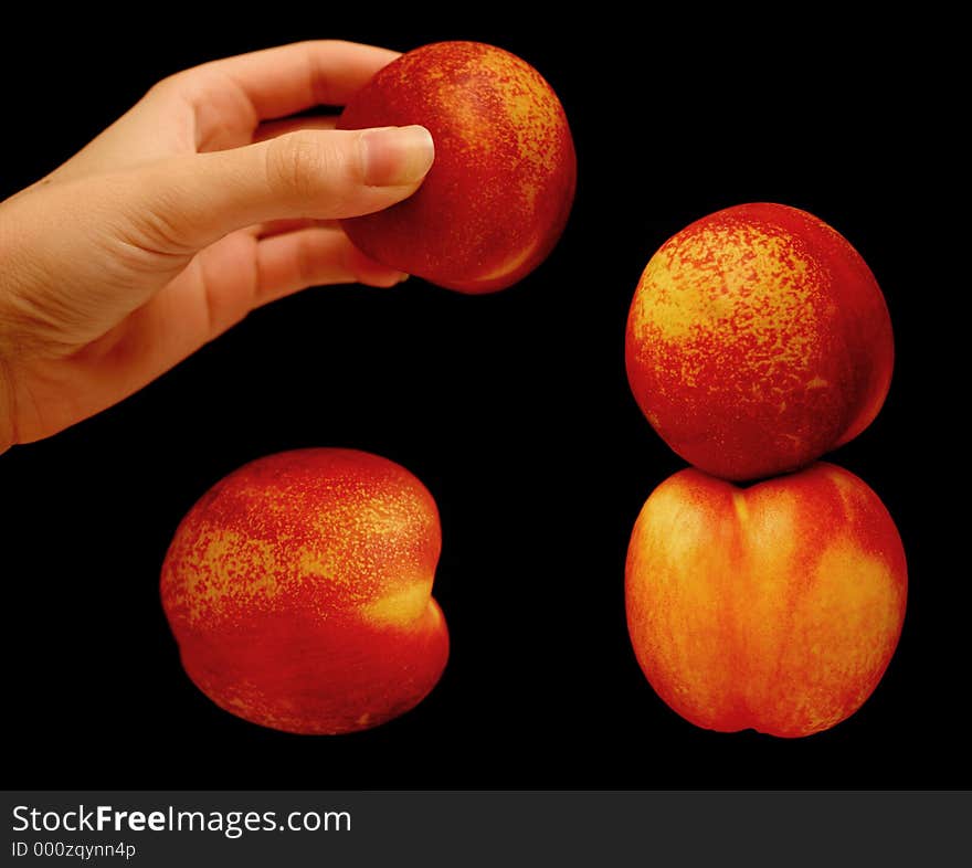 Hand stacking nectarines