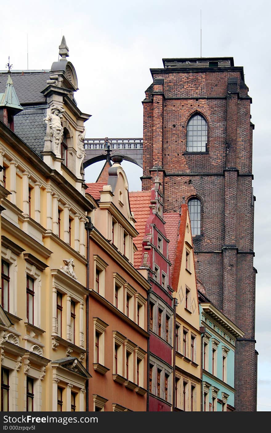 Renaissance tenement-houses and gothic church (Mary Magdalene church in Wroclaw, Poland). Renaissance tenement-houses and gothic church (Mary Magdalene church in Wroclaw, Poland).