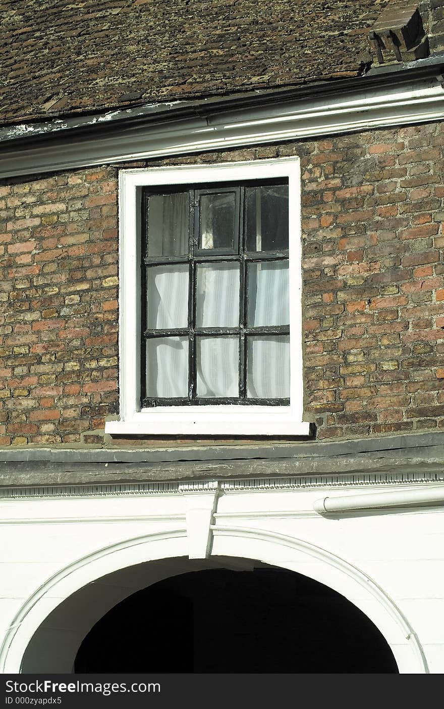 Window in old building distorted by age. Window in old building distorted by age