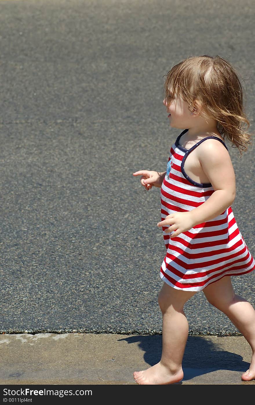 2 year old toddler singing and dancing down the street. 2 year old toddler singing and dancing down the street