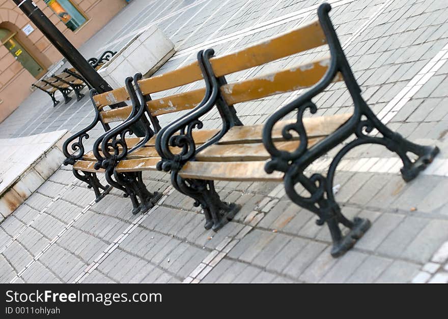 A series of benches in a park