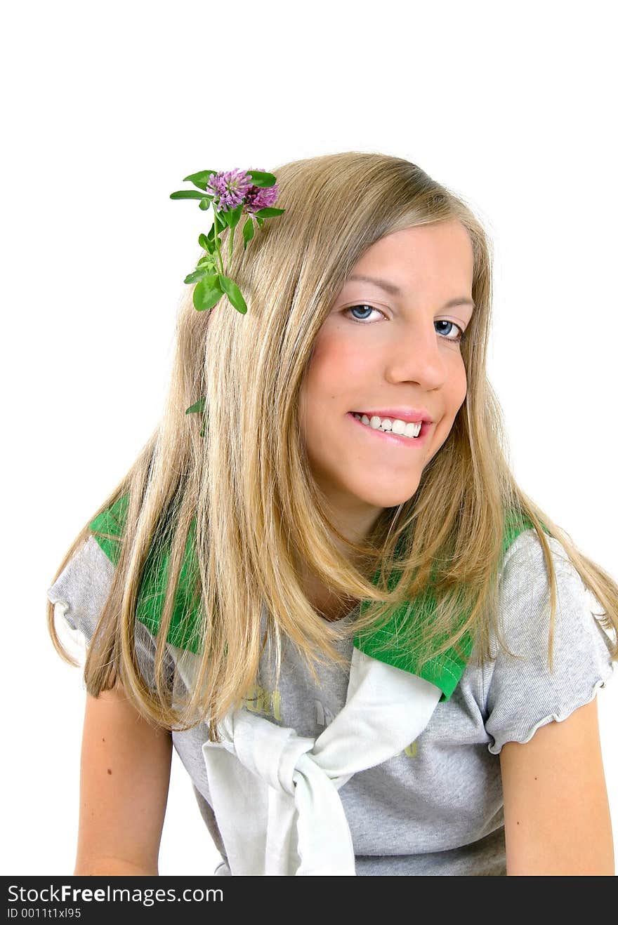Portrait of a girl with flowers in her hair. Portrait of a girl with flowers in her hair.