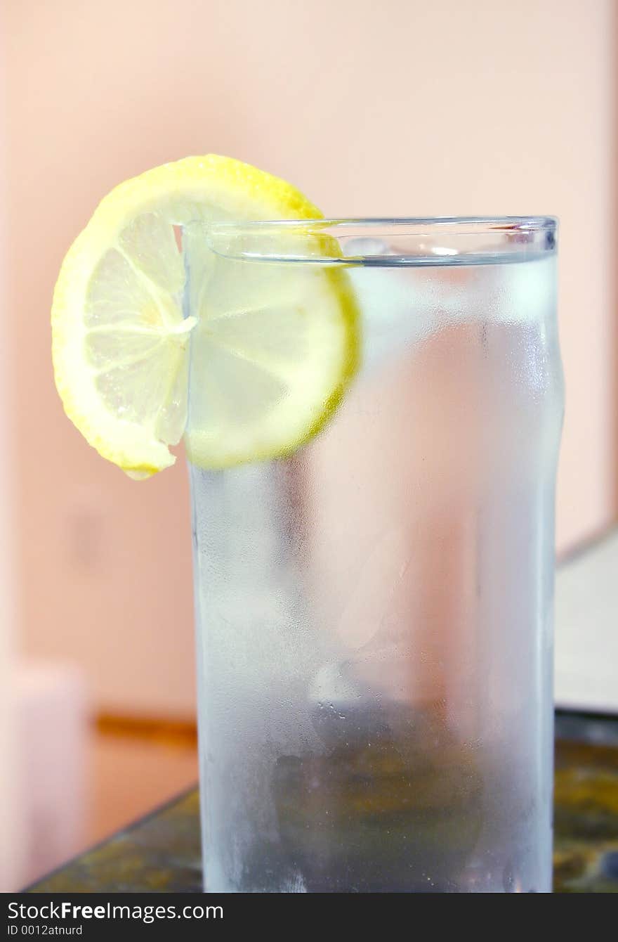 Glass of water on a kitchen table