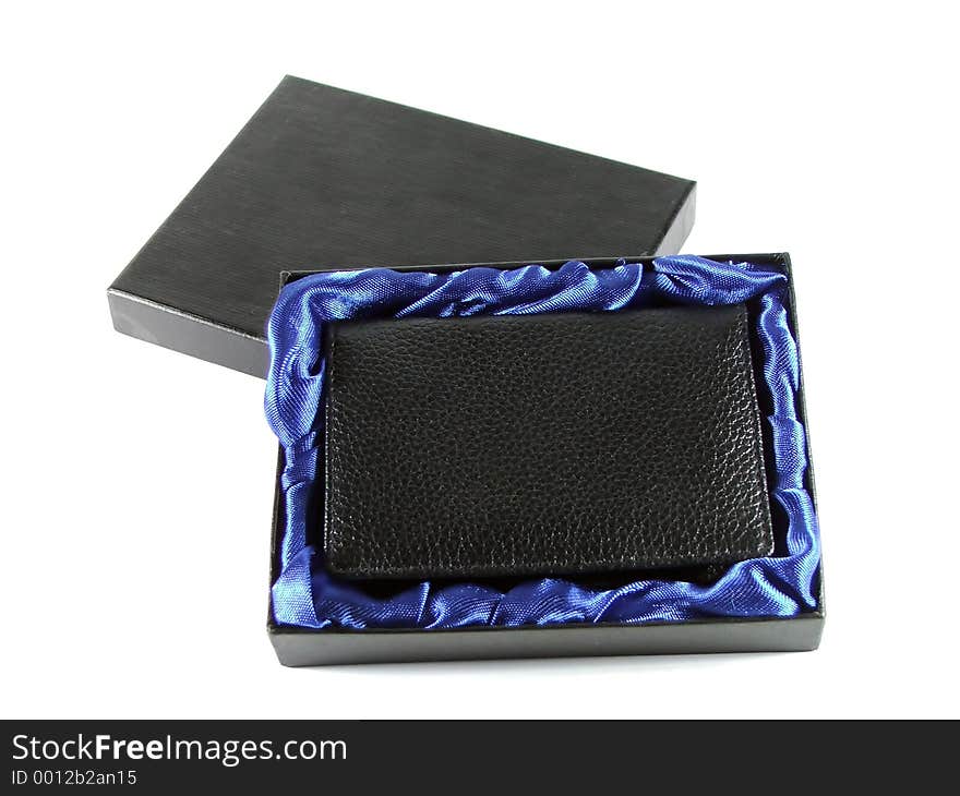 Gift box with a small leather wallet in it. Gift box with a small leather wallet in it