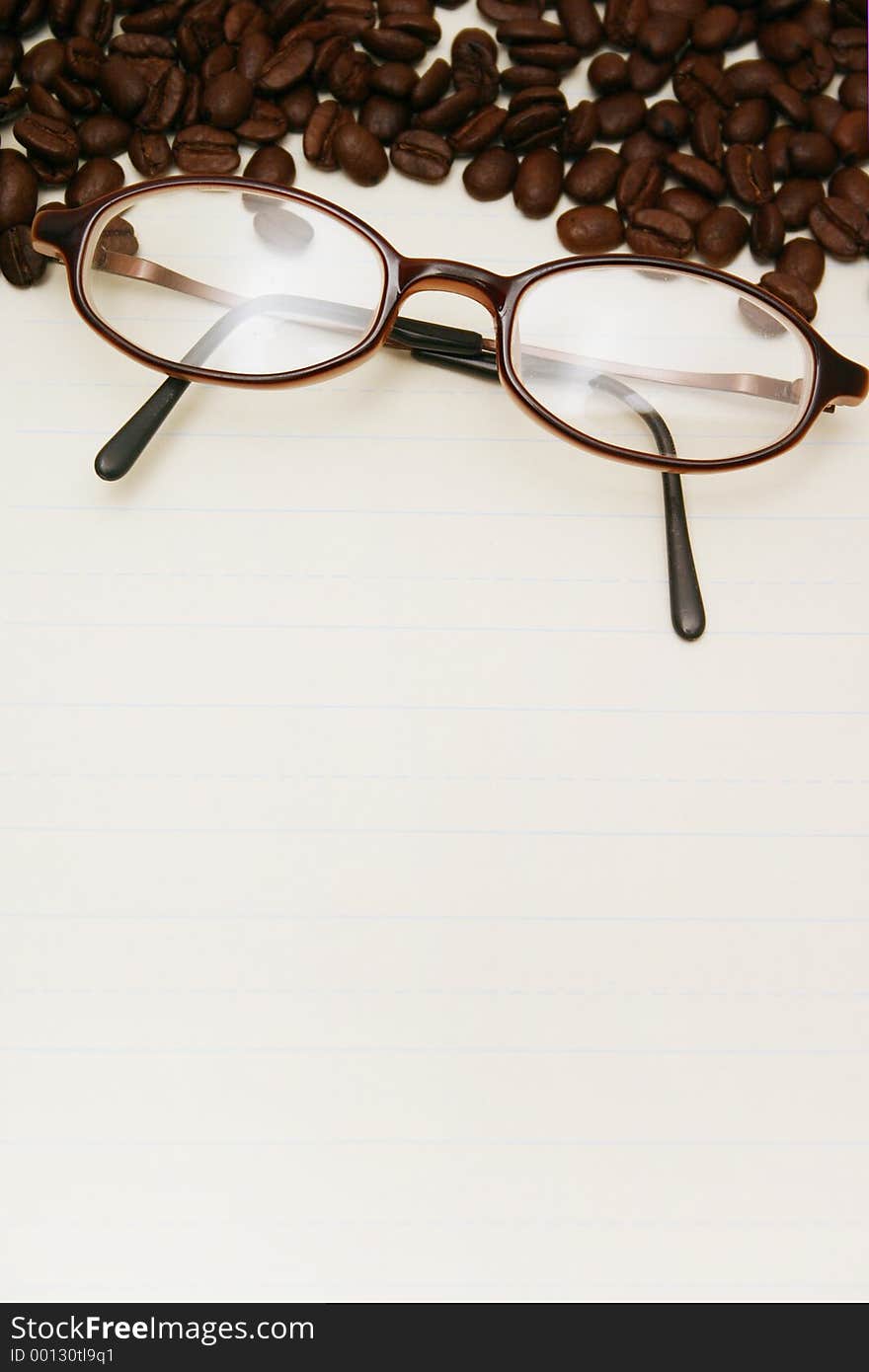 Lined loose leafpaper with coffee beans and glasses. Lined loose leafpaper with coffee beans and glasses