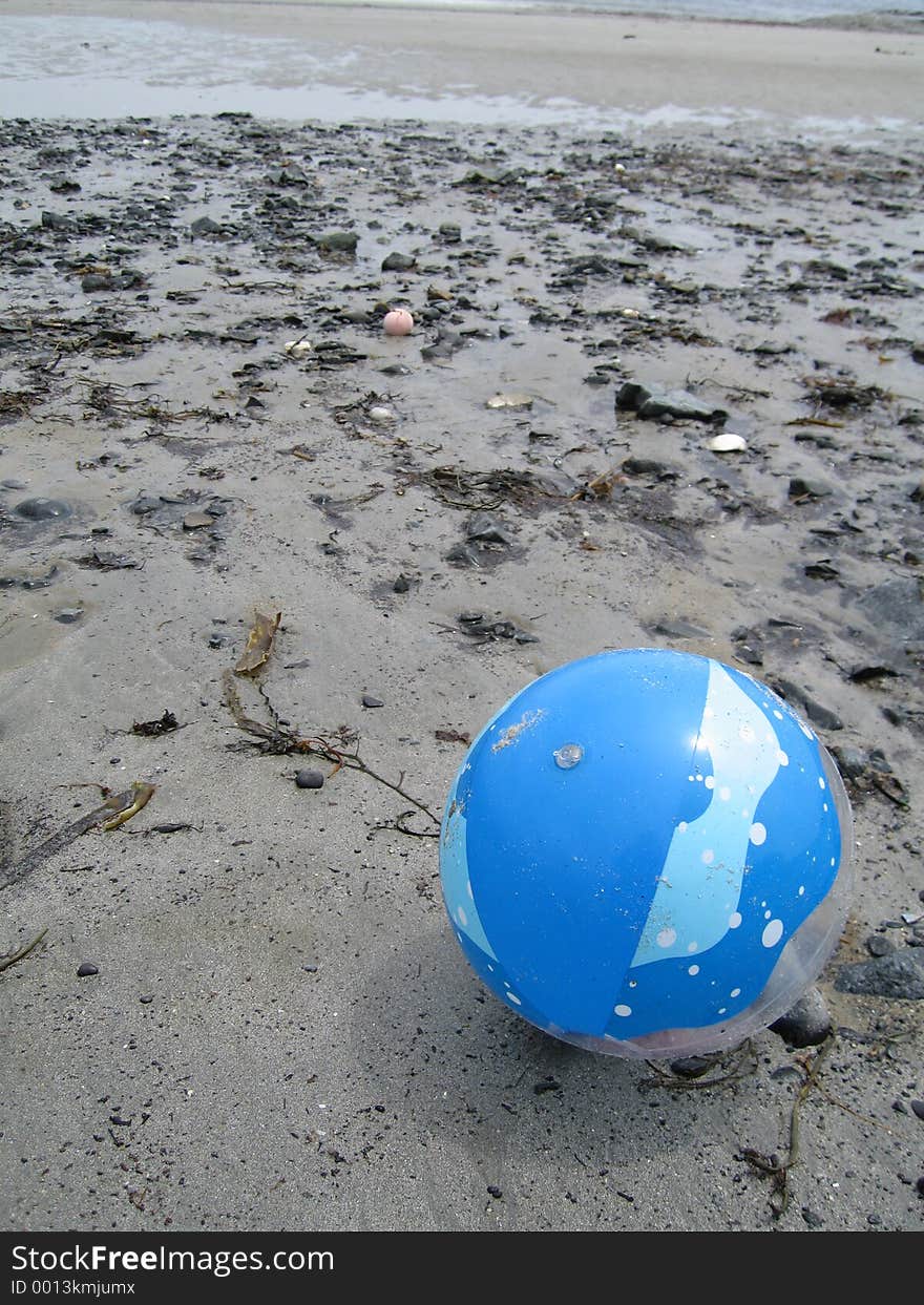 Plastic Blue Ball on Beach