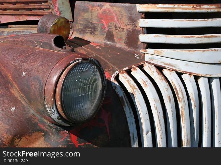 Headlight of an old, rusting chevy truck. focus on headlight. Headlight of an old, rusting chevy truck. focus on headlight.