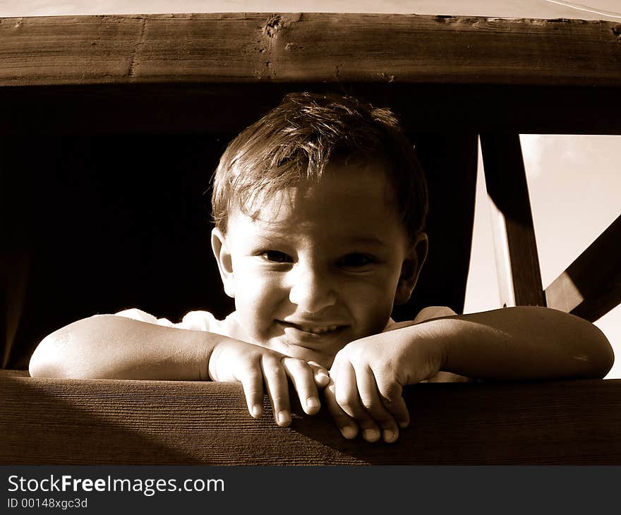 Boy smiling on playground. Boy smiling on playground