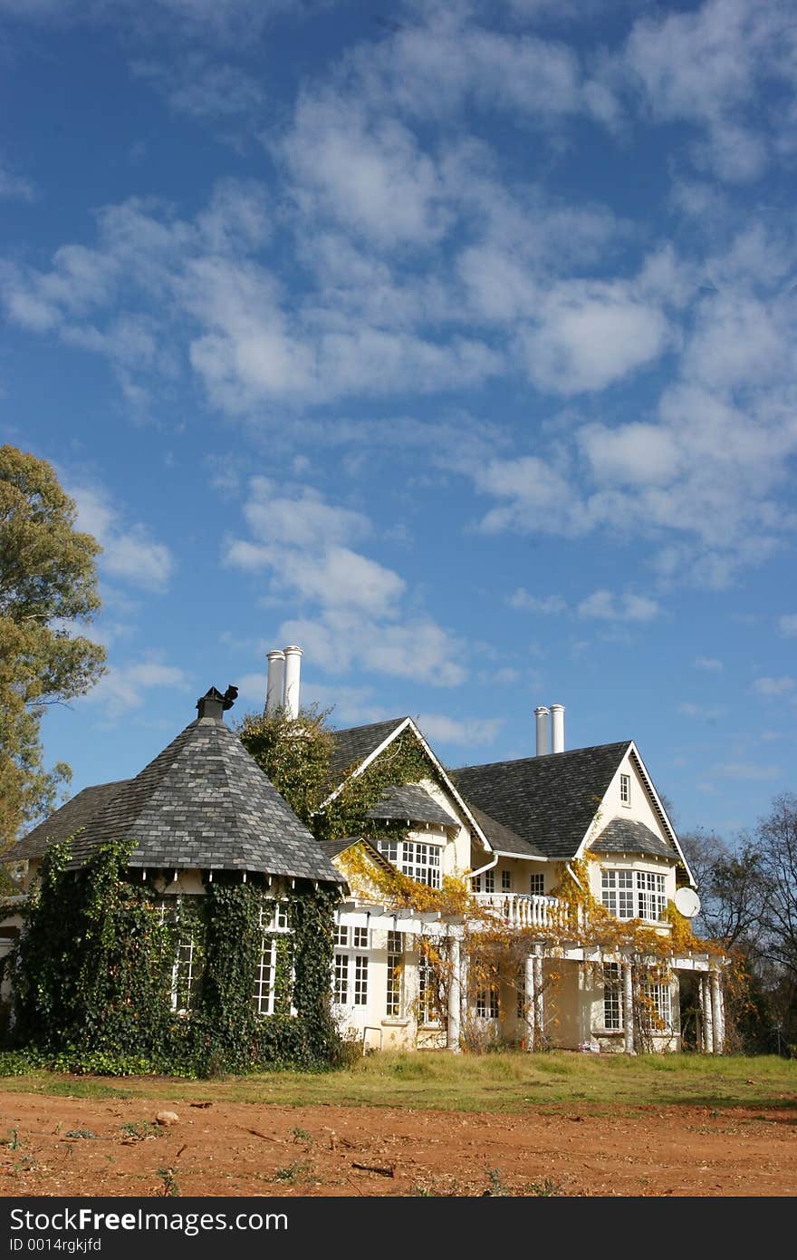 Country style house with a lovely blue sky