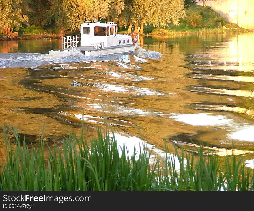 Ship on a golden river