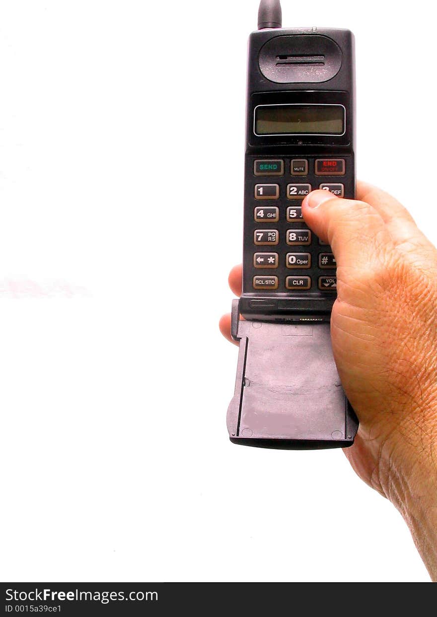 A hand holding a cell phone over white. A hand holding a cell phone over white