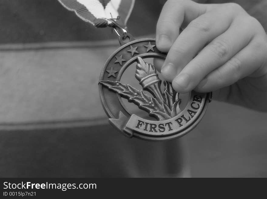 Child proudly displaying his 1st accomplishment. Child proudly displaying his 1st accomplishment.