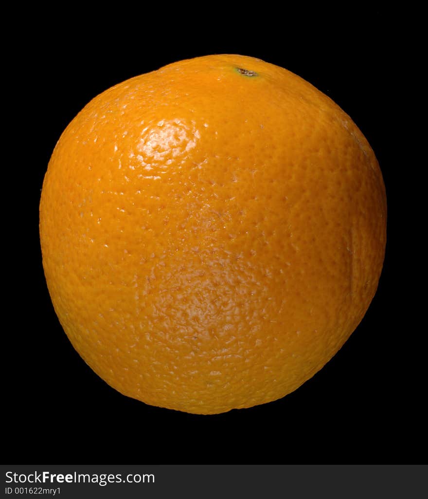 An orange isolated over black. An orange isolated over black