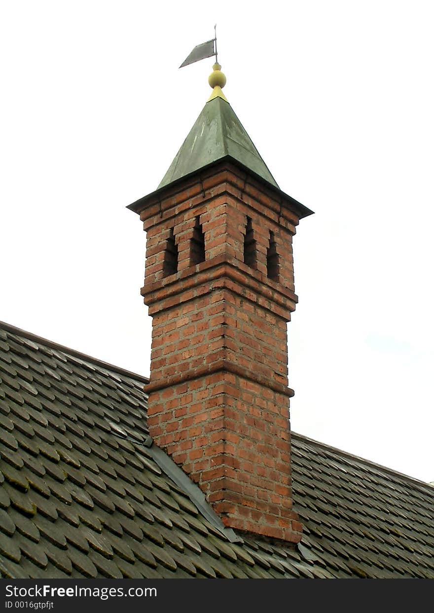 Brick chimney and shingle roof (architectural detail)