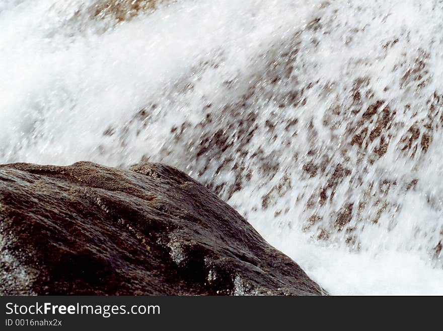 Rushing mountain river with white water. Rushing mountain river with white water