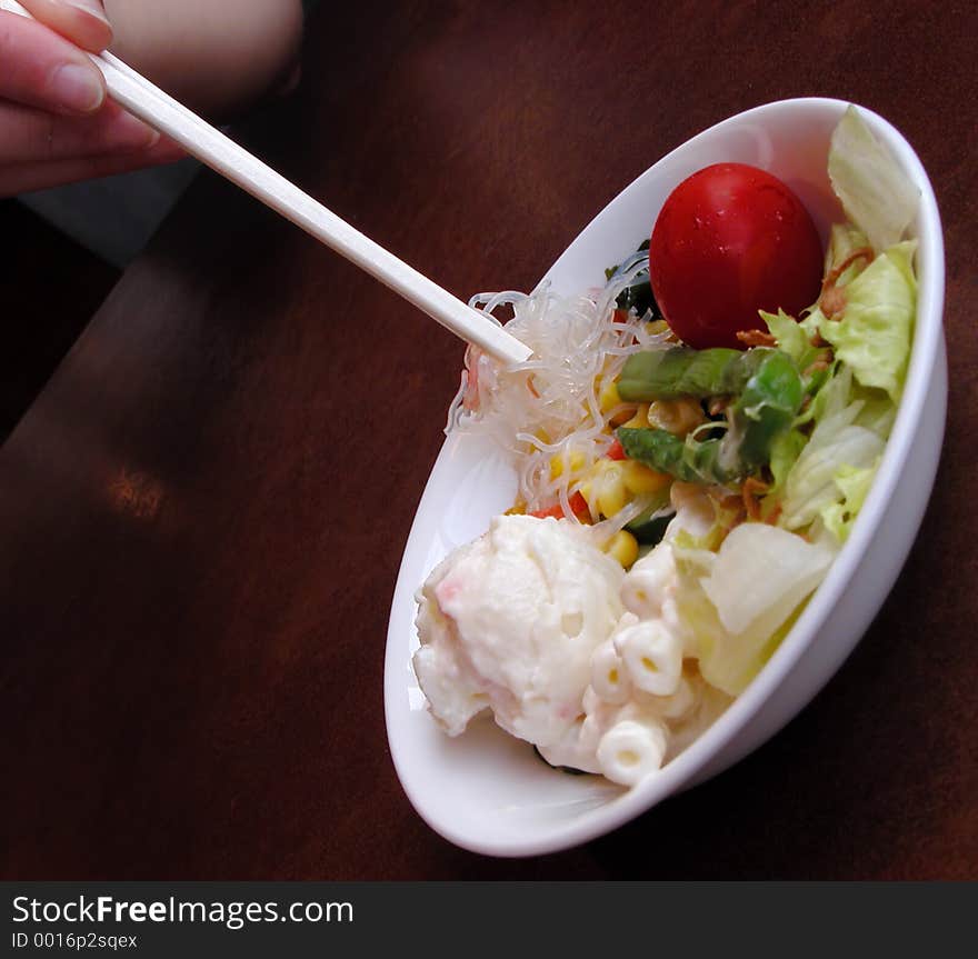 Salad and chopsticks-interesting perspective