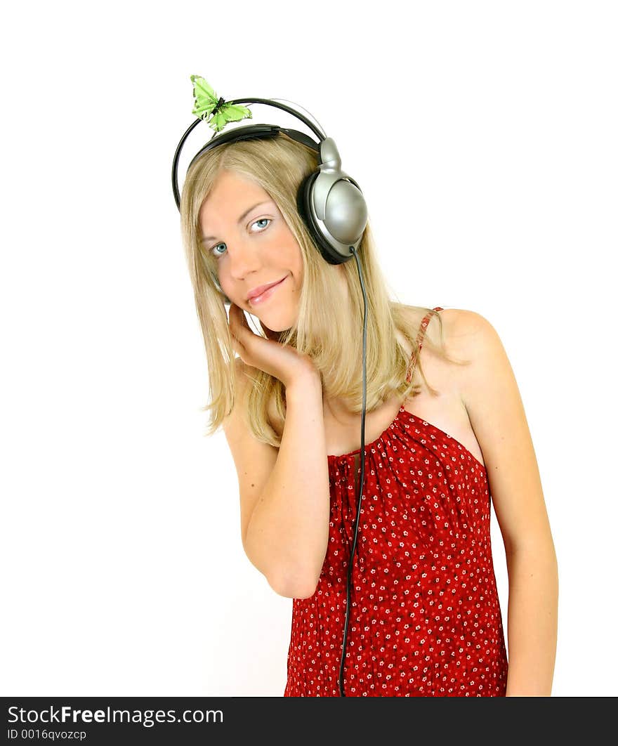 A young girl with headphones. A young girl with headphones