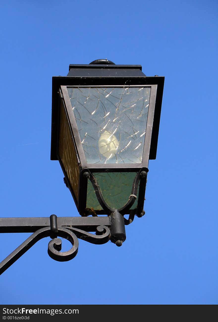 Street light on blue sky background