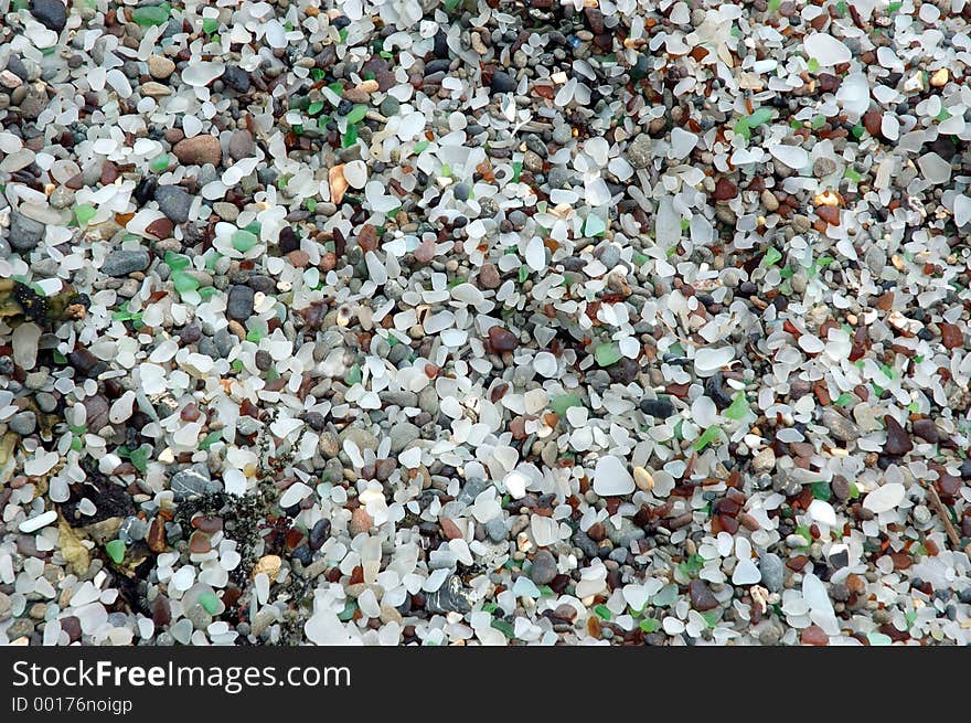 Shore at Glass Beach small pieces of worn glass. Shore at Glass Beach small pieces of worn glass