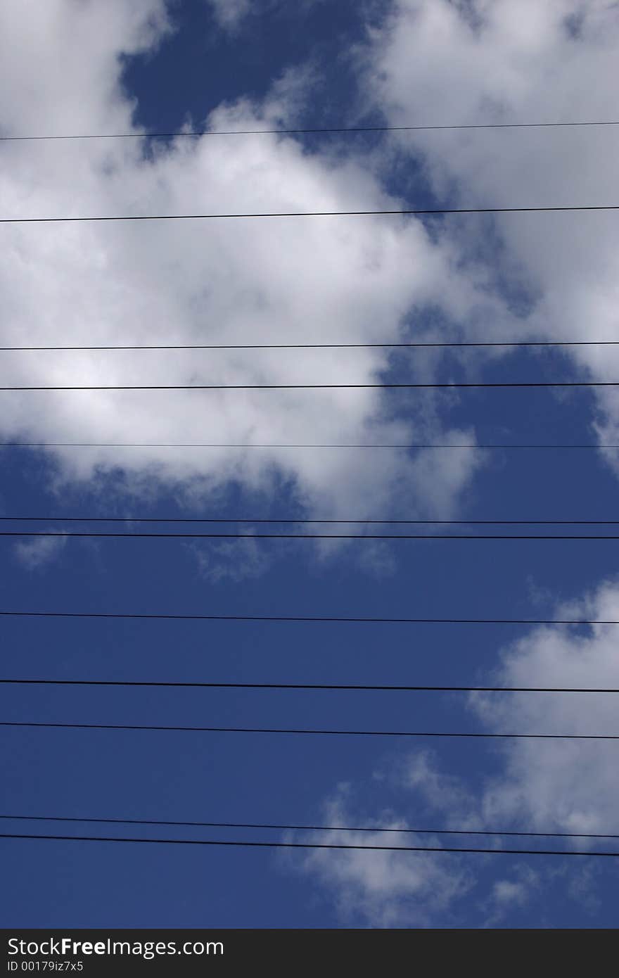 Power lines on a blue sky