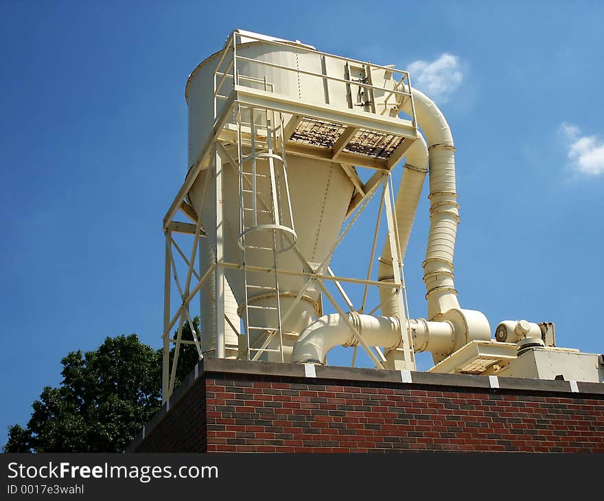 Baler on roof of publishing plant