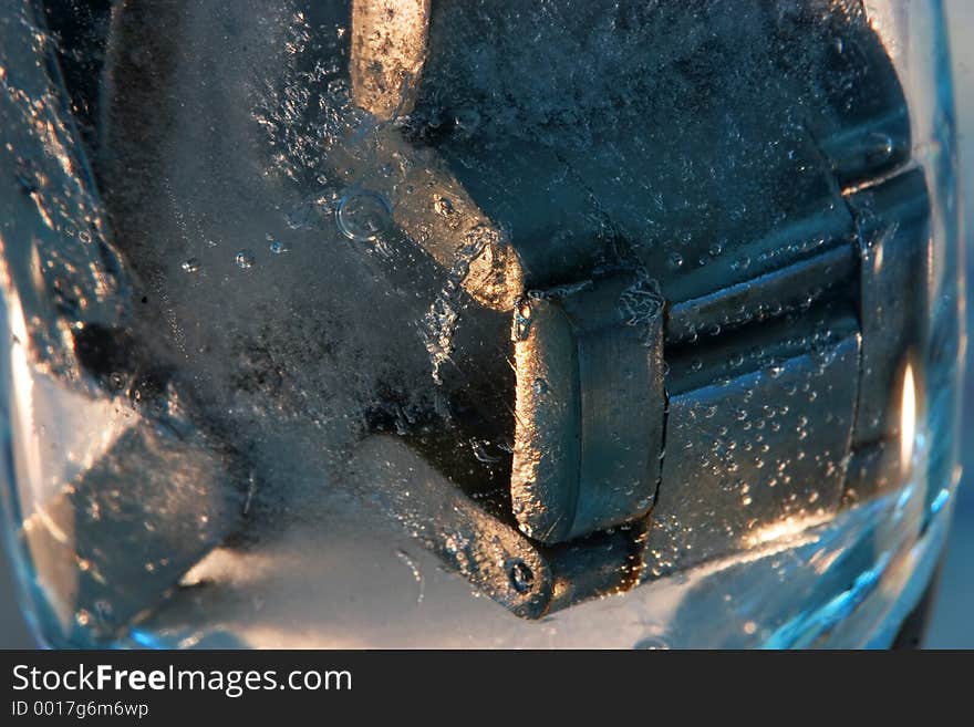 Abstract watch bracelet frozen in ice. Abstract watch bracelet frozen in ice