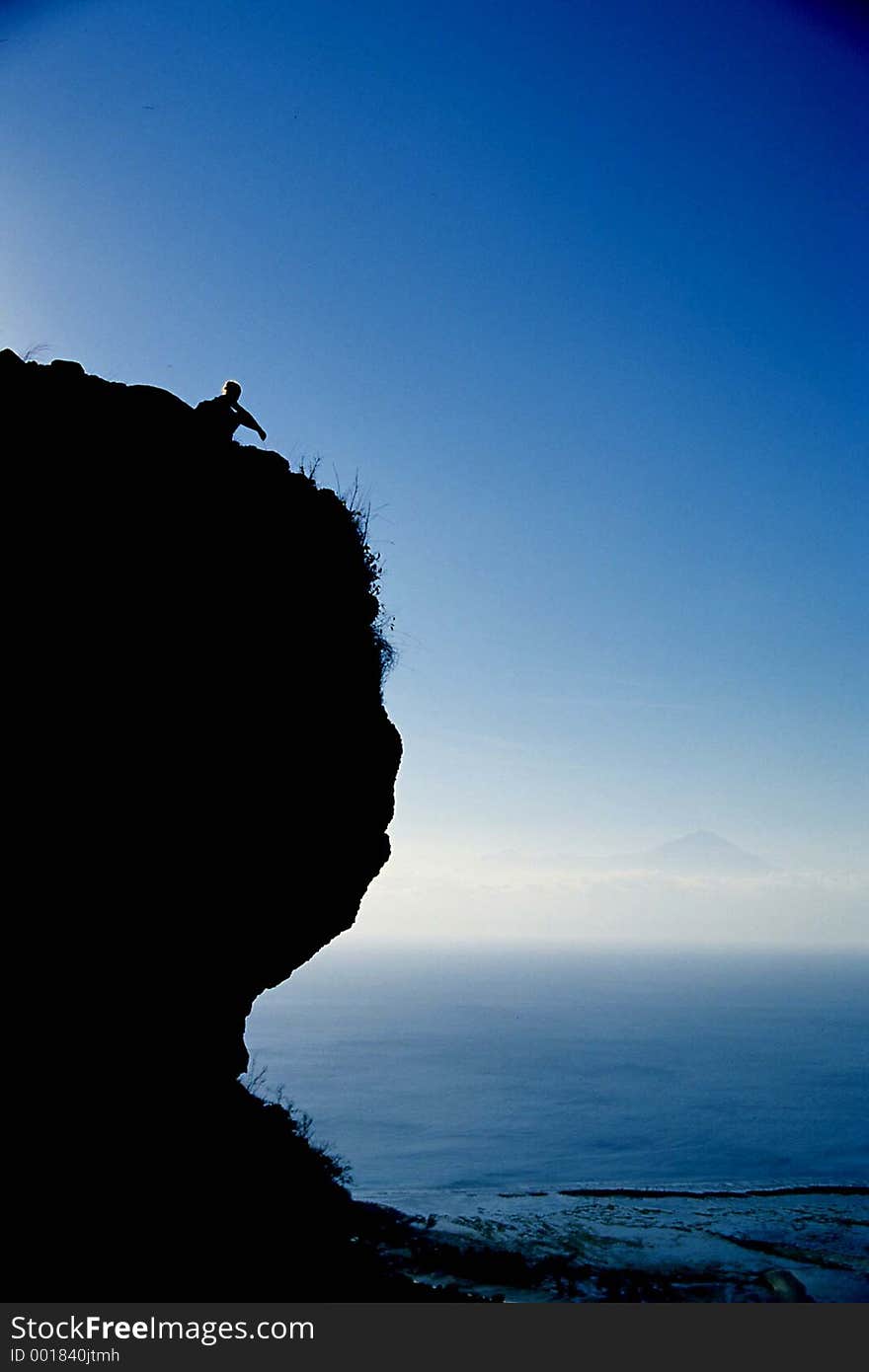 Woman at the top of a mountain. sumbawa, indonesia