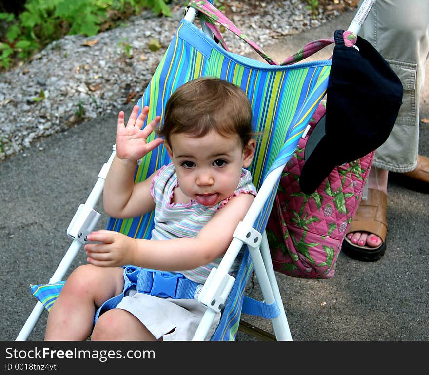 Cute baby girl with an attitude doing a raspberry with her tongue. Shot with a Canon 20D. Cute baby girl with an attitude doing a raspberry with her tongue. Shot with a Canon 20D.