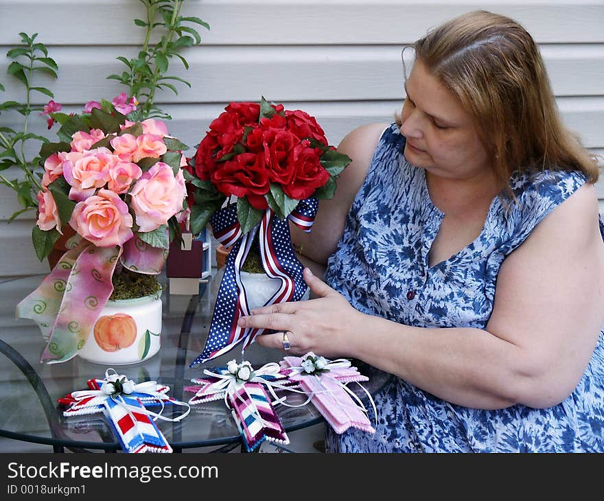 Artist with flower craft creations. Artist with flower craft creations