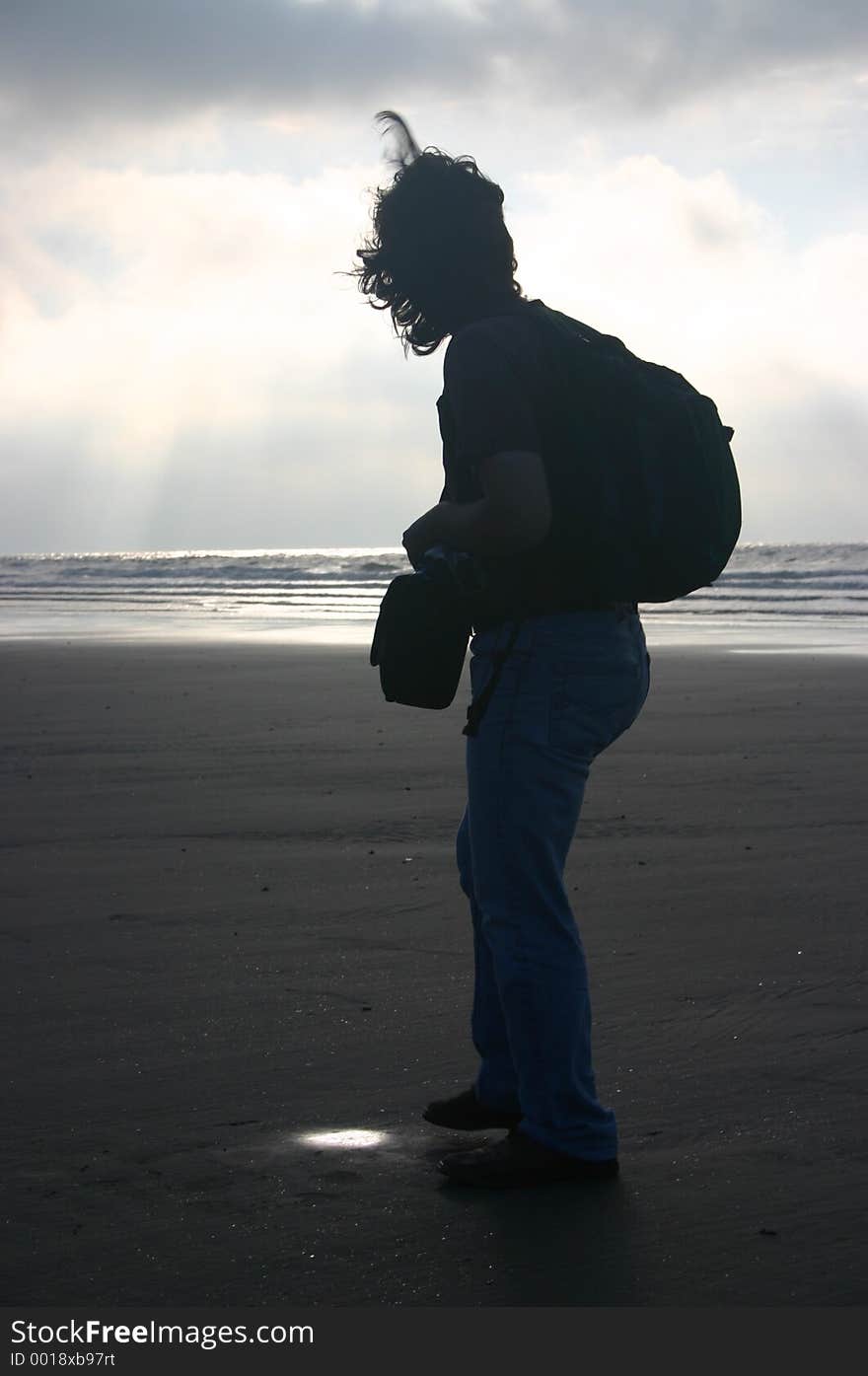 Sky,clouds,grey,water,sea,waves,men,hair,whait,beautiful. Sky,clouds,grey,water,sea,waves,men,hair,whait,beautiful