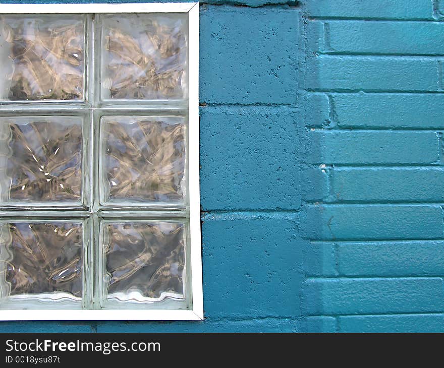 Wonderful old window with turquoise bricks. Wonderful old window with turquoise bricks.